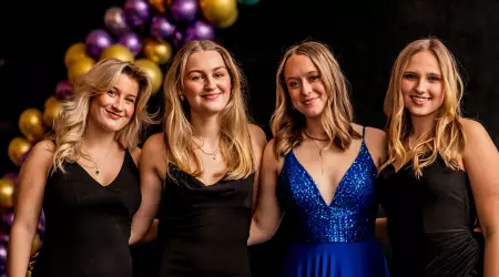 Nina Parsons (girl in blue dress)